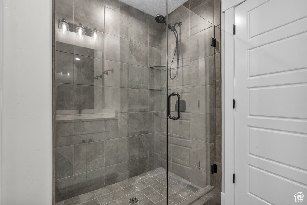 Full bathroom with a stall shower