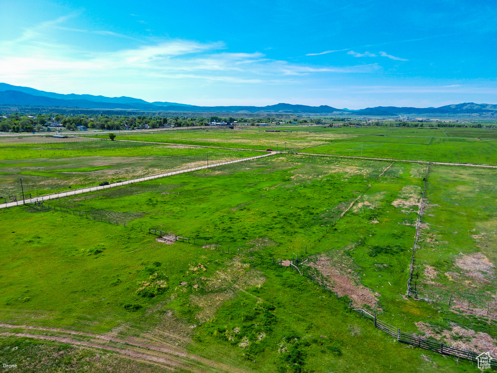 Aerial view of sparsely populated area featuring a mountainous background