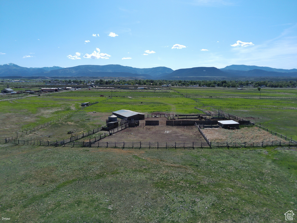 View of mountain background featuring rural landscape and agricultural land