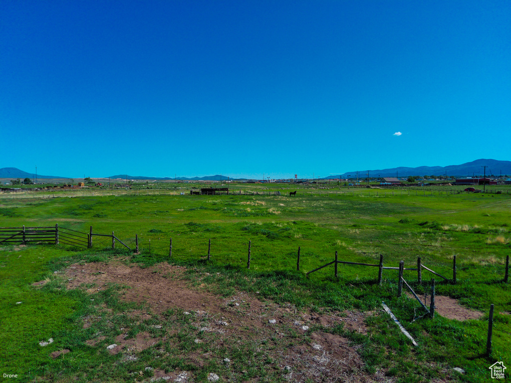 View of yard with a view of countryside and a mountain view