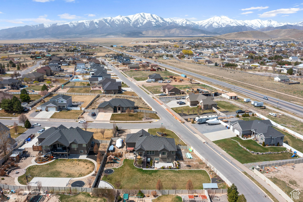 Drone / aerial view featuring a mountain view and a residential view