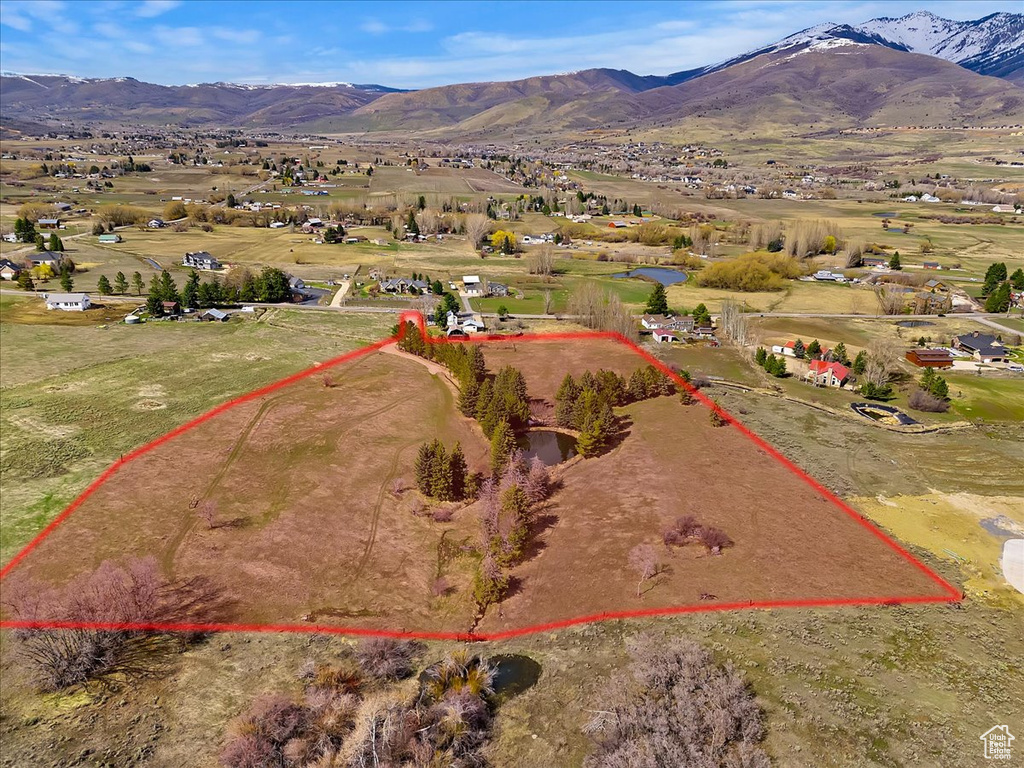 Drone / aerial view with a rural view and a mountain view