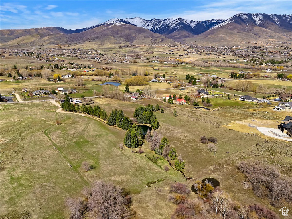 Birds eye view of property featuring a mountain view