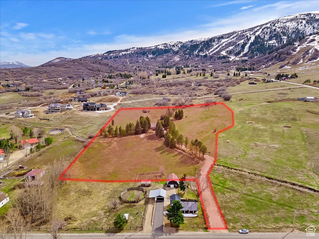 Drone / aerial view featuring a rural view and a mountain view
