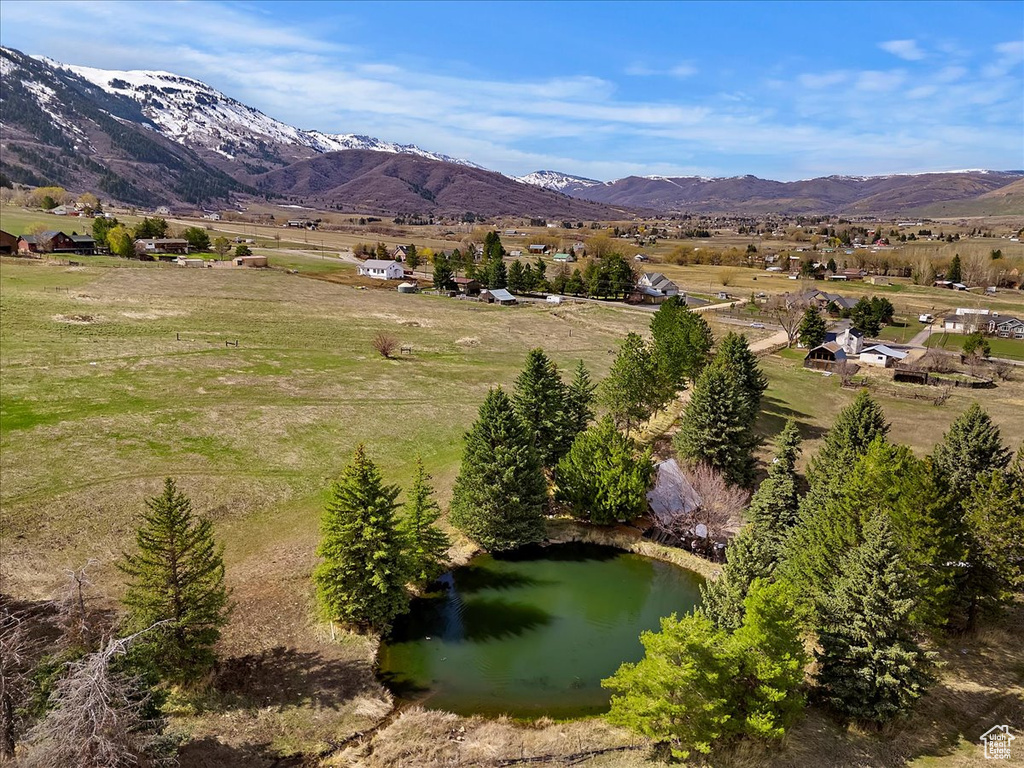 Birds eye view of property featuring a rural view and a mountain view