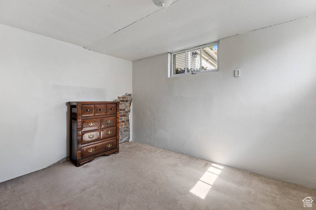 Basement with carpet