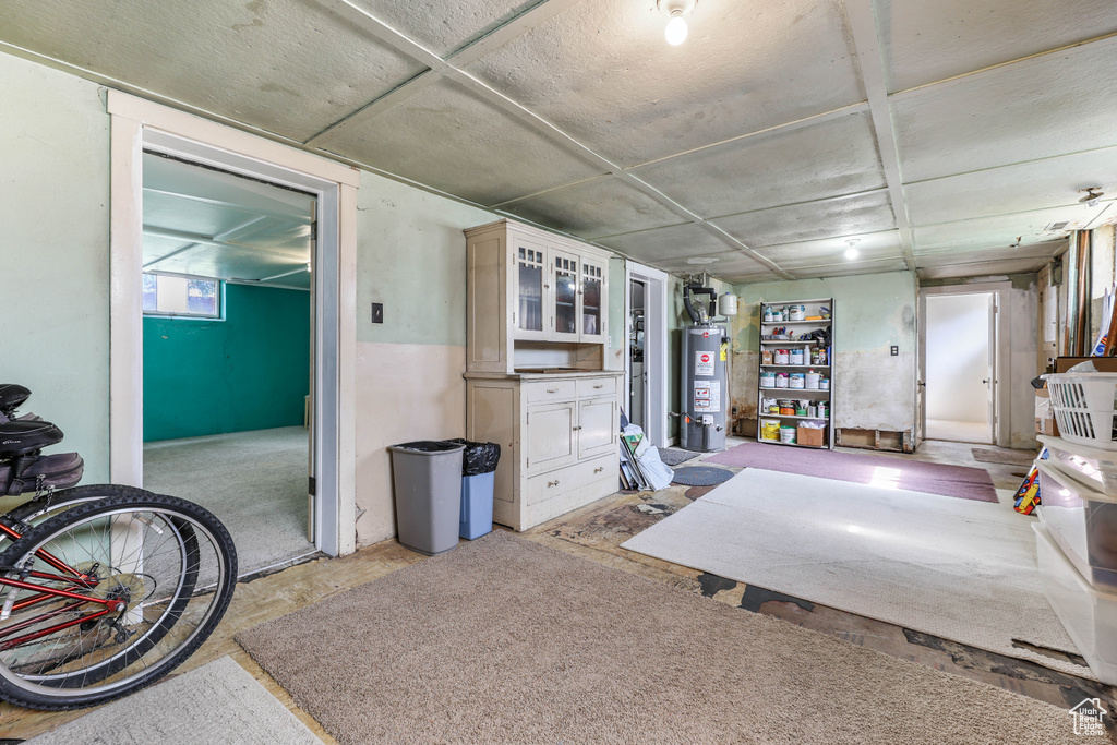 Living area featuring water heater