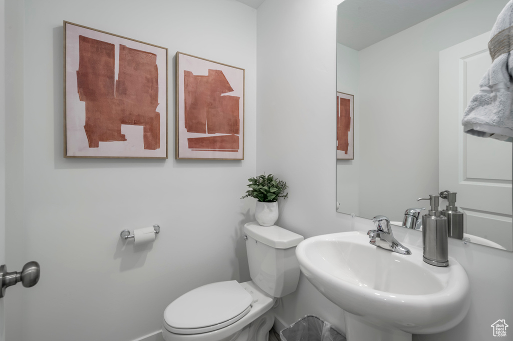Bathroom with a sink and toilet