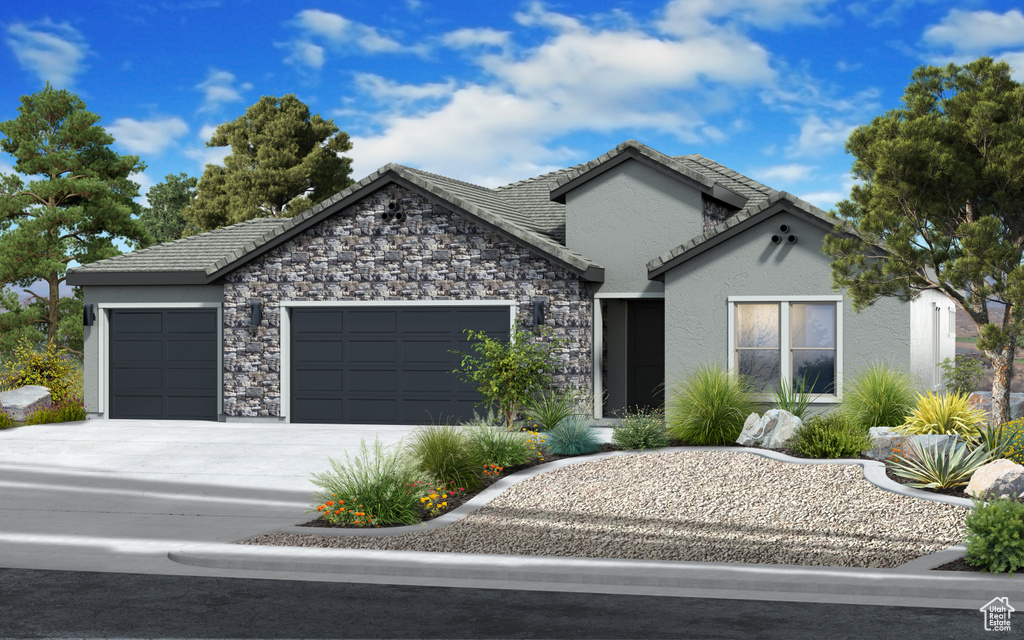 Single story home featuring stucco siding, driveway, stone siding, a garage, and a tiled roof