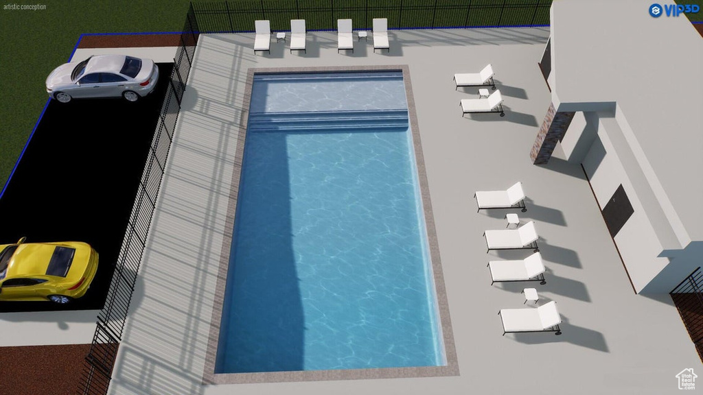 View of swimming pool with fence
