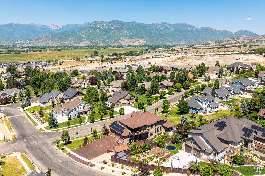 Drone / aerial view featuring a mountain view and a residential view