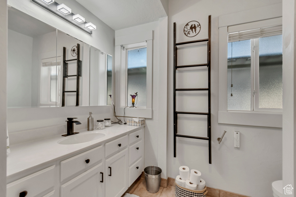 Bathroom featuring toilet and vanity
