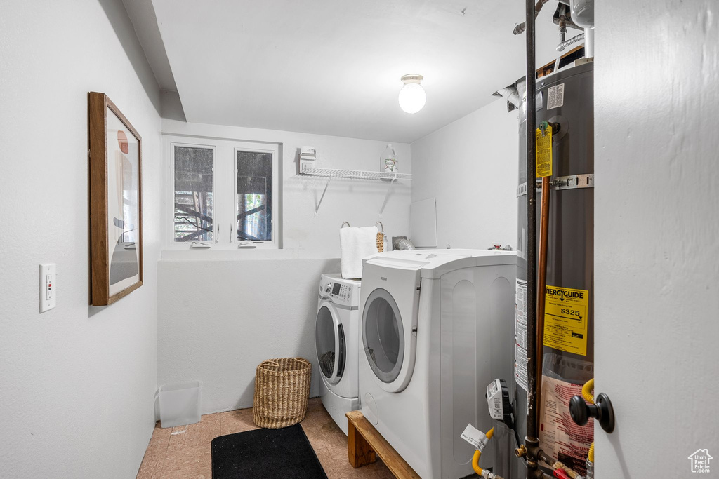 Laundry area with washing machine and dryer and secured water heater