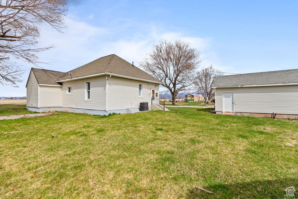 View of yard featuring central AC
