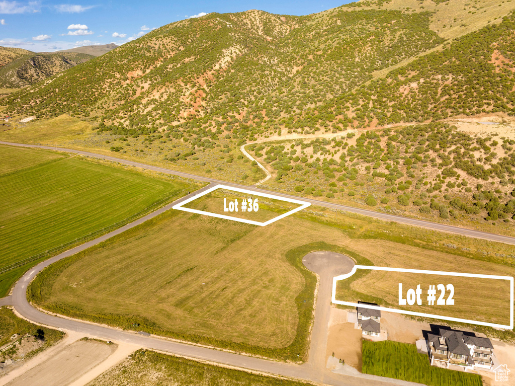 Aerial view featuring a mountain view and a rural view