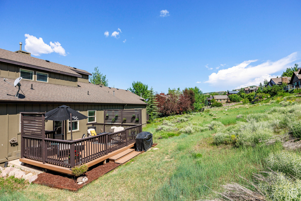 View of yard featuring a deck
