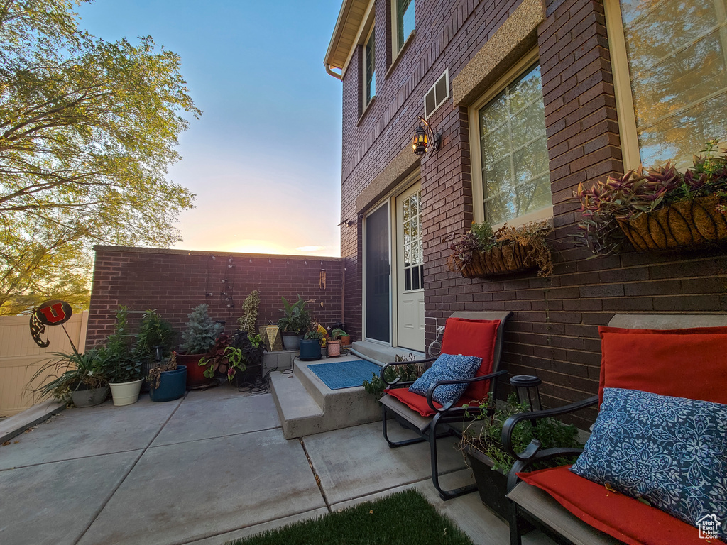 Patio terrace at dusk with fence
