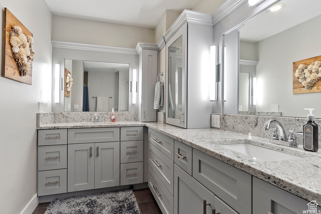 Full bath featuring vanity