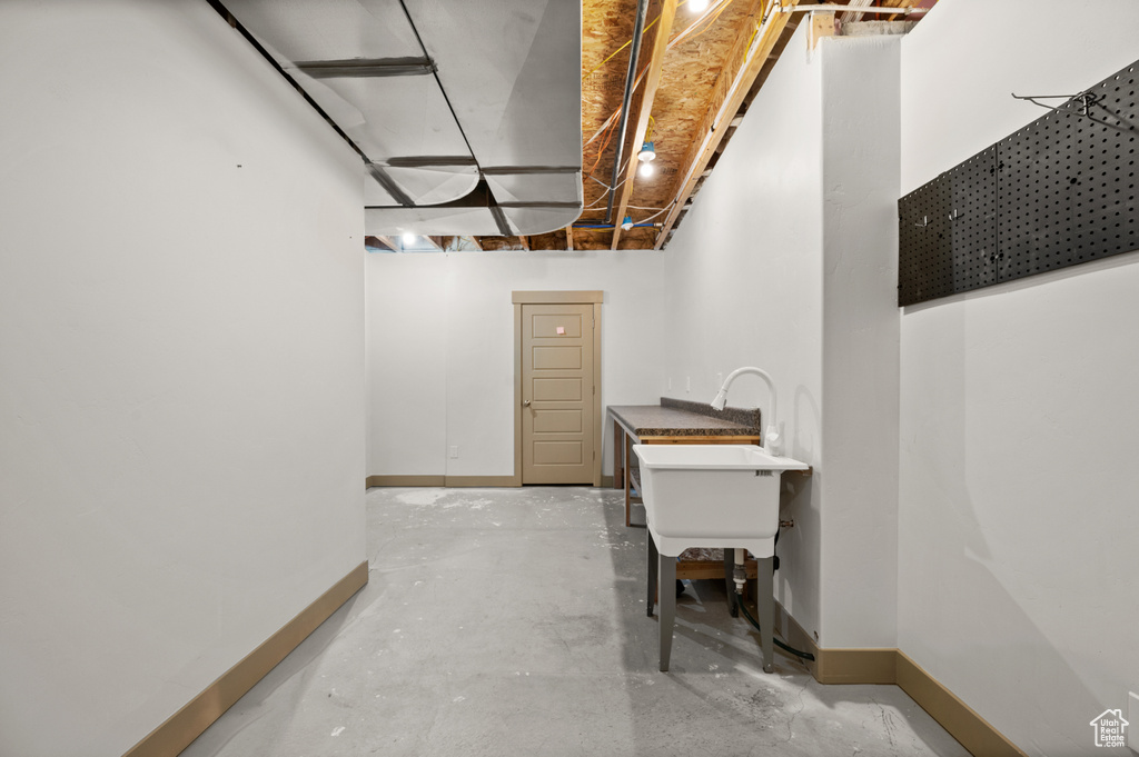 Basement featuring baseboards