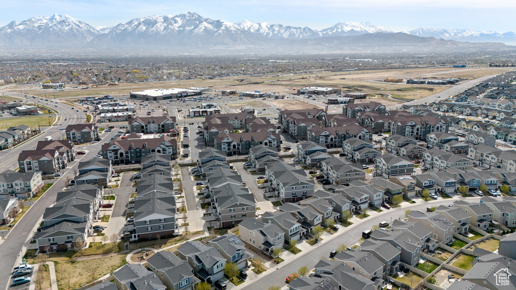 Birds eye view of property featuring a mountain view and a residential view