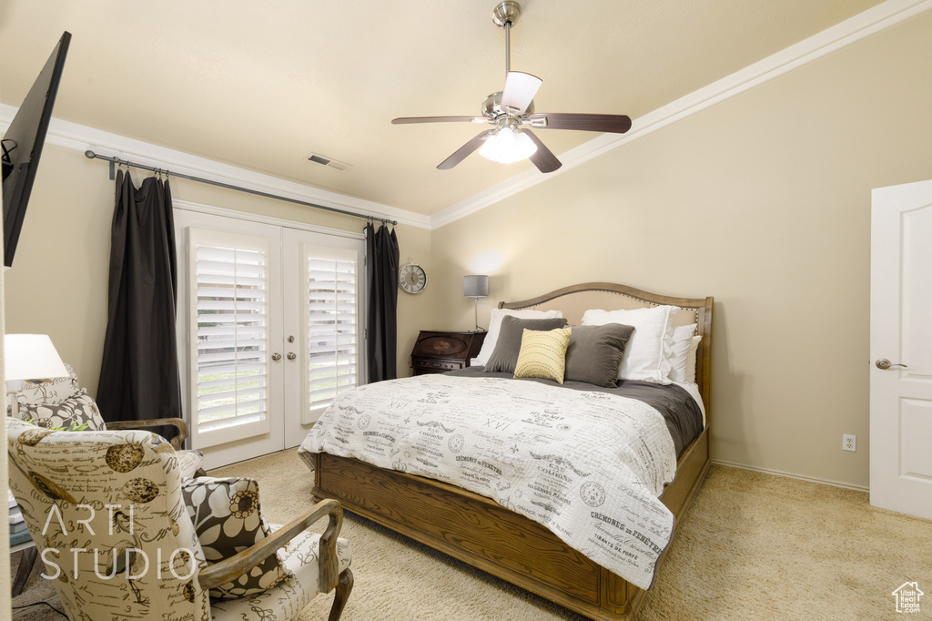 Bedroom featuring access to outside, ornamental molding, light carpet, visible vents, and ceiling fan