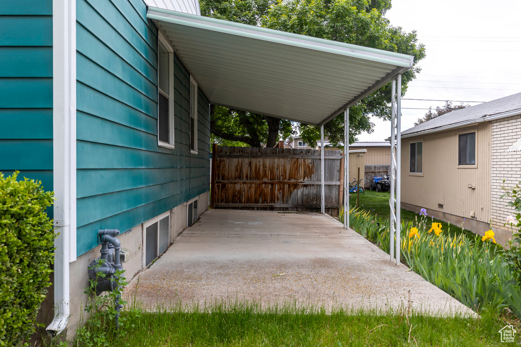 View of patio featuring a carport