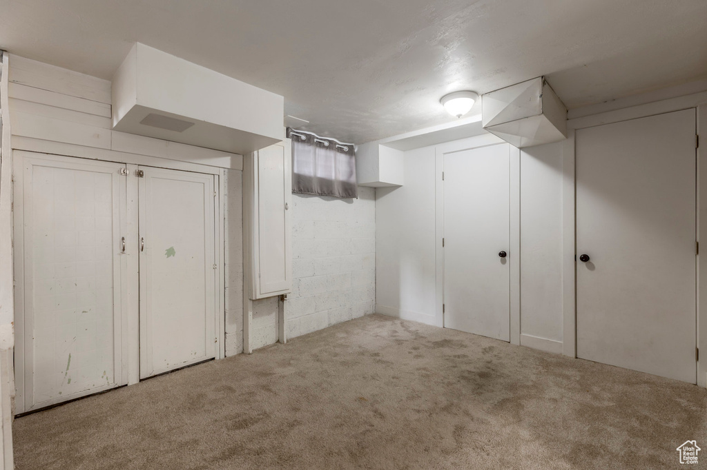 Finished basement featuring carpet flooring