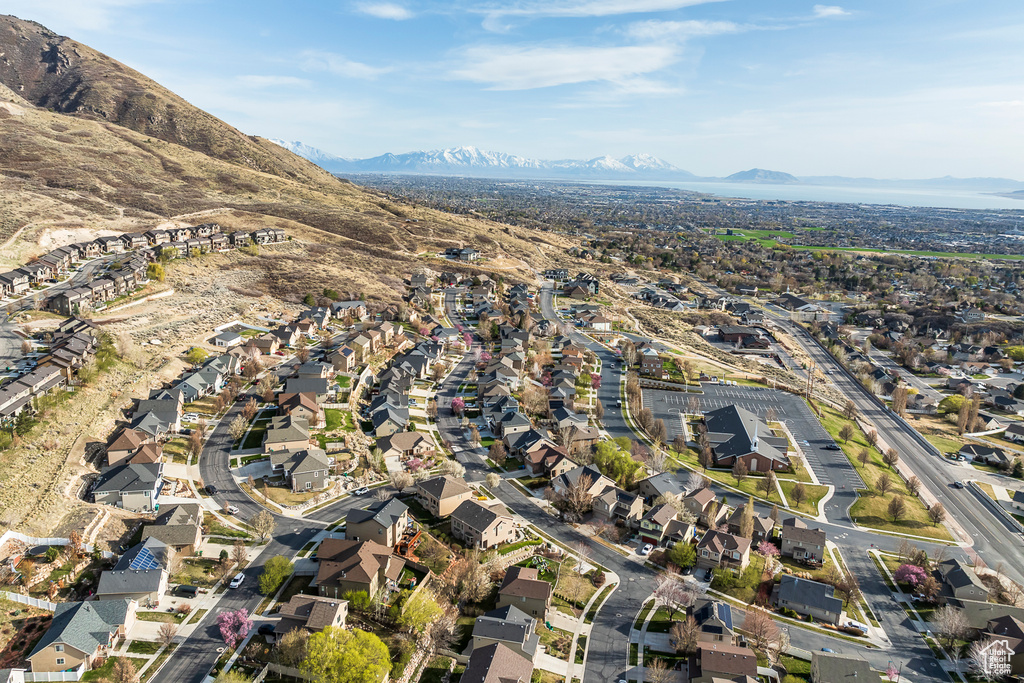 Birds eye view of property featuring a mountain view and a residential view
