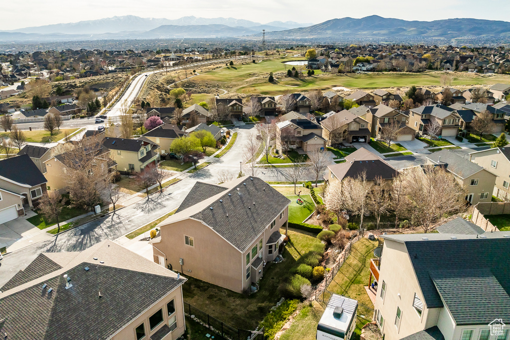 Birds eye view of property featuring a mountain view and a residential view