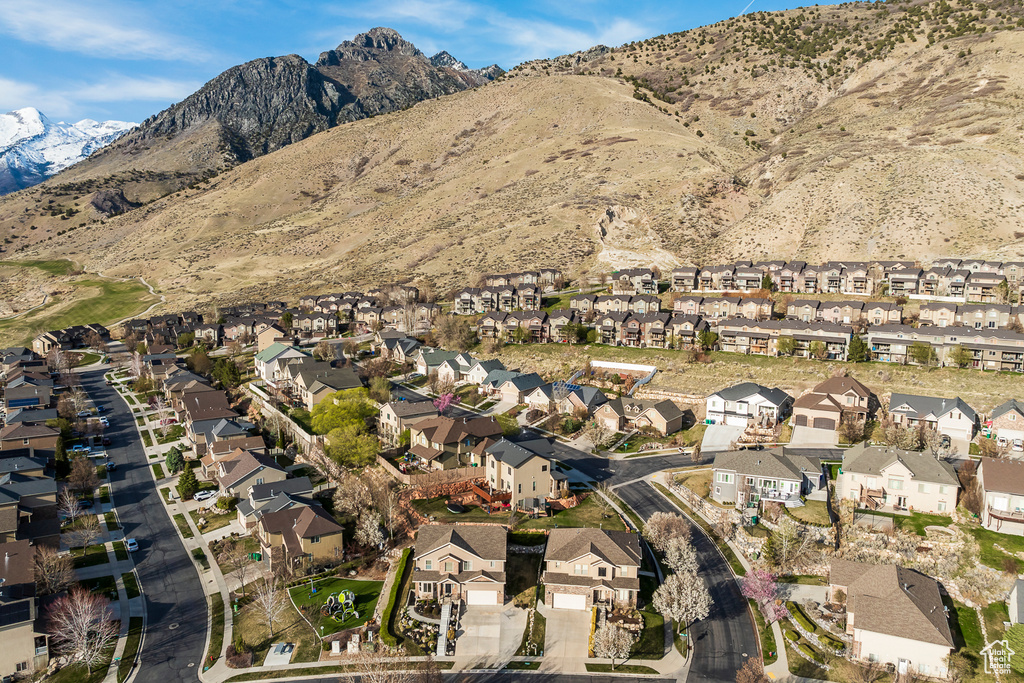 Birds eye view of property featuring a mountain view and a residential view