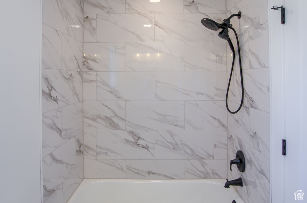 Full bathroom with shower / bathtub combination