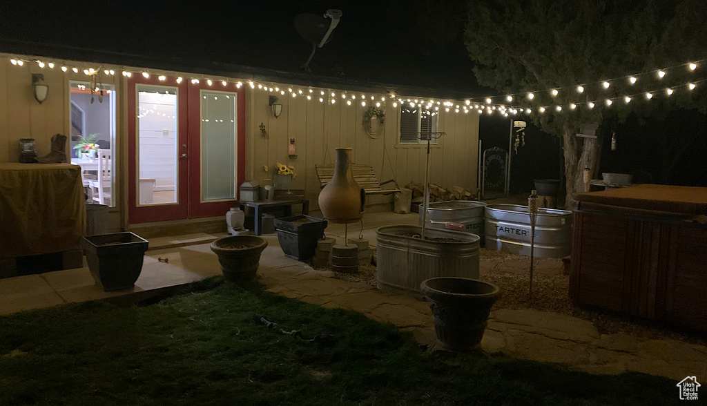 Patio at night with french doors