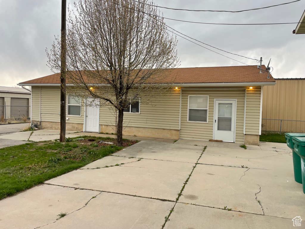 Rear view of property with a patio area