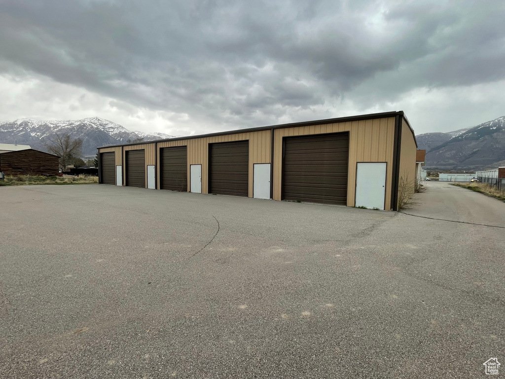 Garage featuring a mountain view