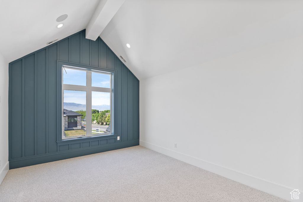 Bonus room featuring carpet flooring, recessed lighting, baseboards, and vaulted ceiling with beams