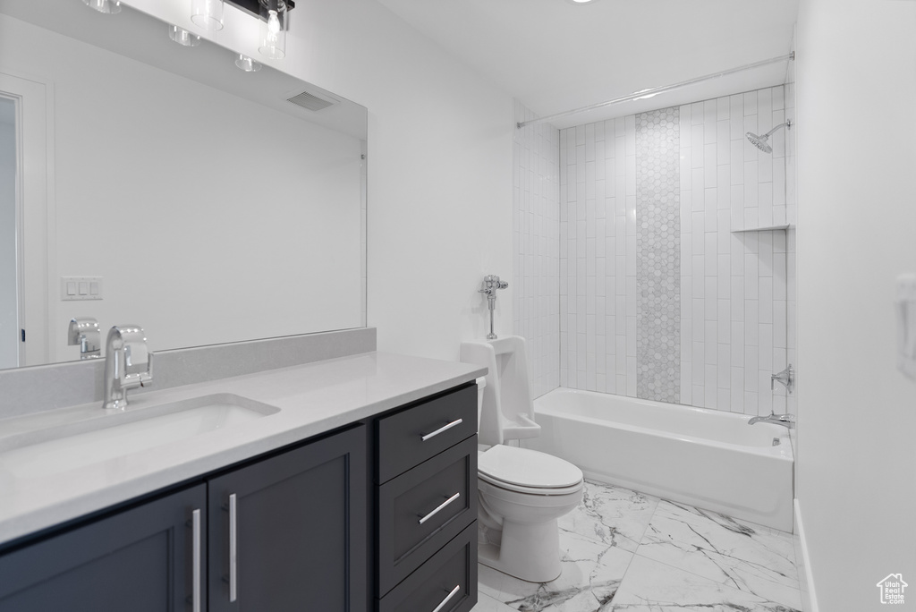 Bathroom with shower / tub combination, vanity, toilet, marble finish floor, and visible vents