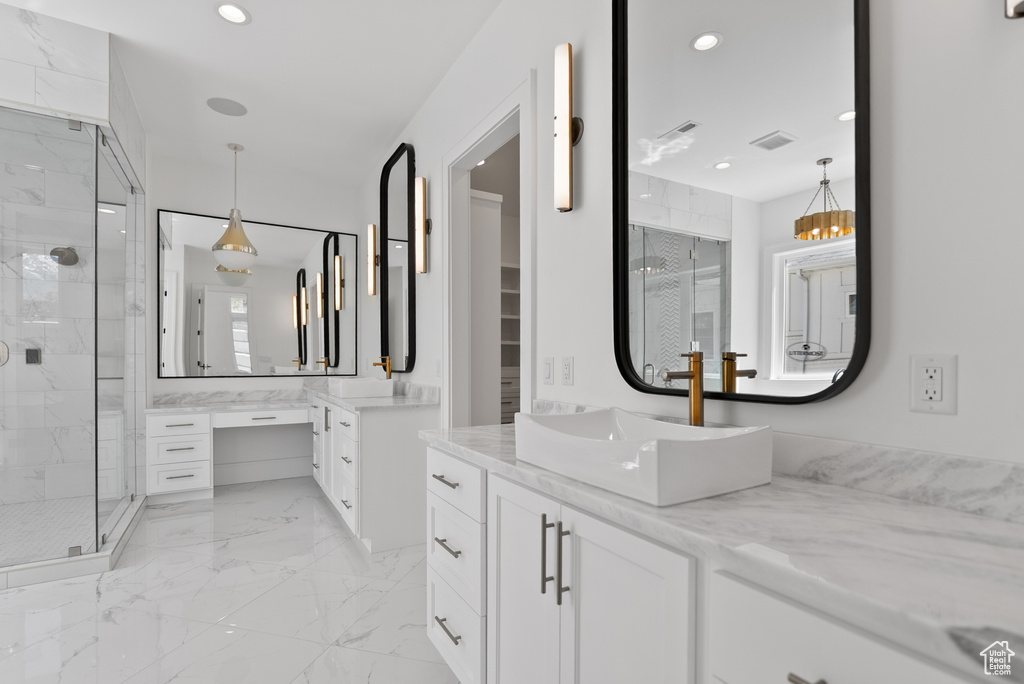 Bathroom featuring recessed lighting, visible vents, marble finish floor, and a stall shower