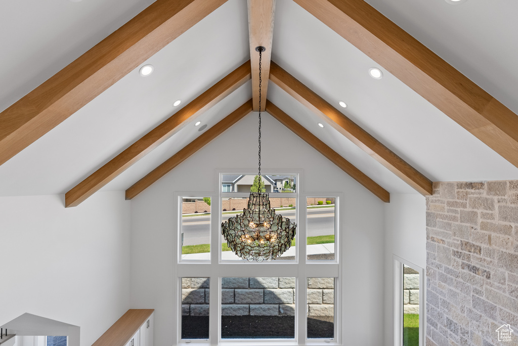 Interior details with an inviting chandelier, recessed lighting, and beam ceiling