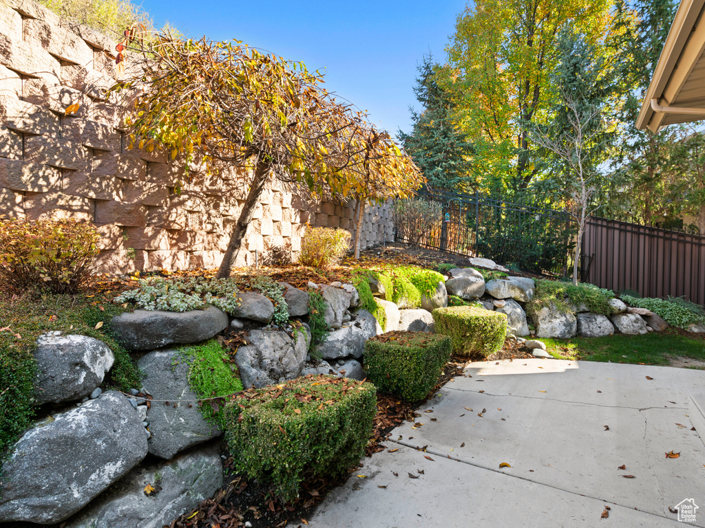 View of yard featuring a patio area and fence