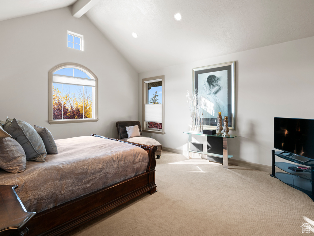 Carpeted bedroom with high vaulted ceiling, beamed ceiling, and baseboards
