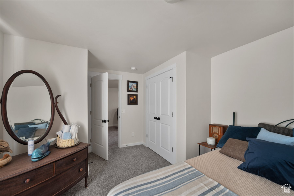 Bedroom featuring carpet floors