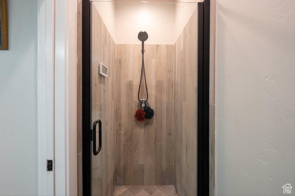 Full bath featuring a stall shower