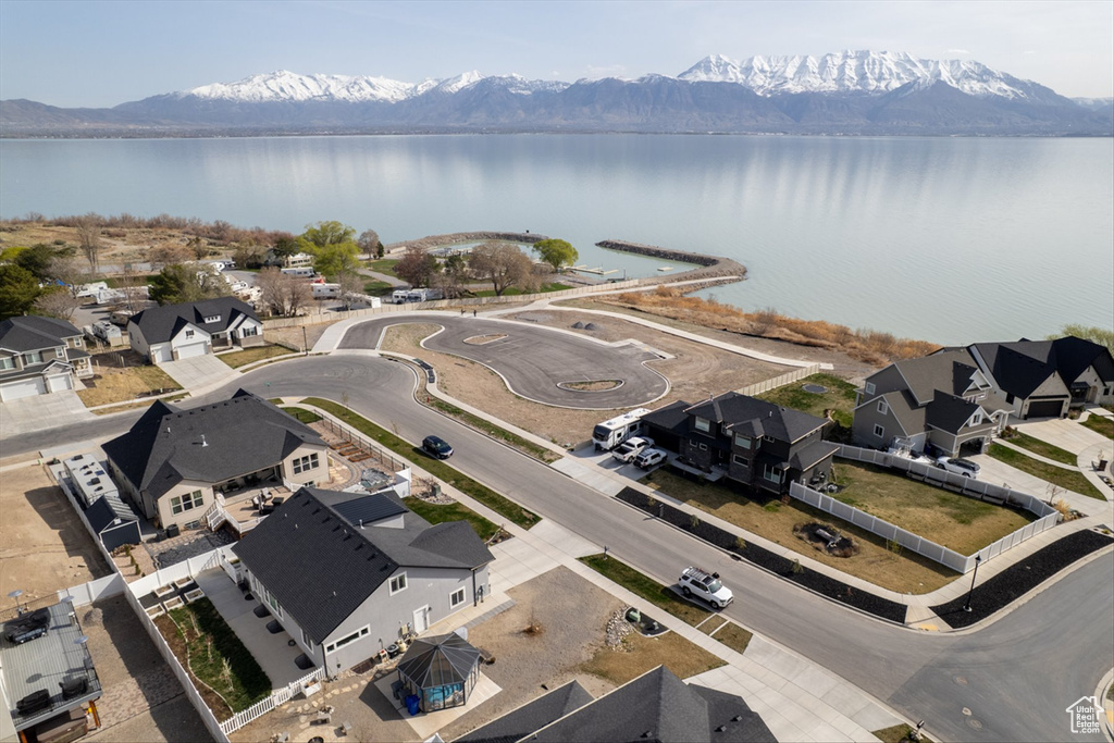 Aerial view featuring a residential view and a water and mountain view