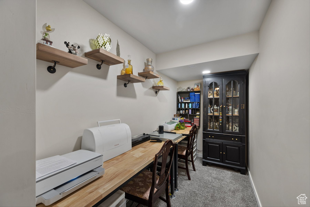 Office area with baseboards and carpet floors