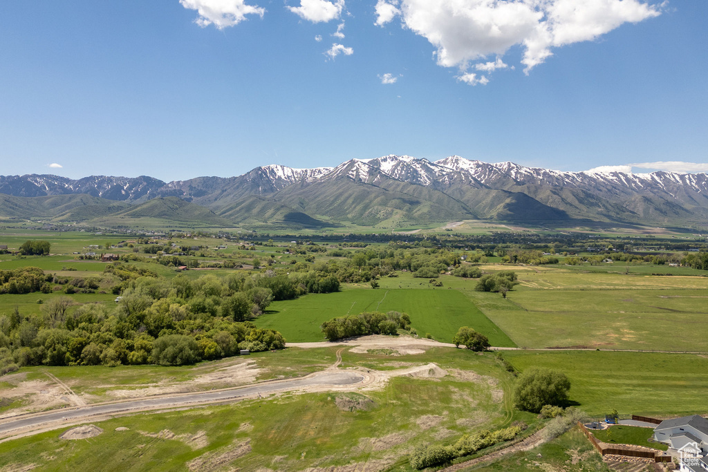 View of mountain backdrop featuring rural landscape