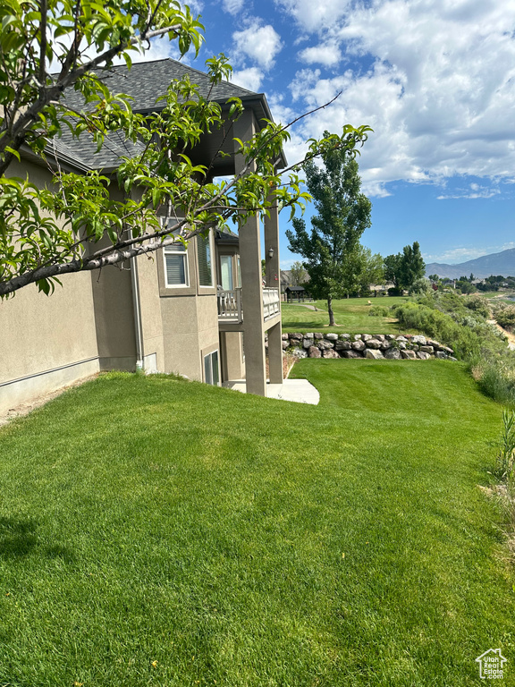 View of yard with a mountain view