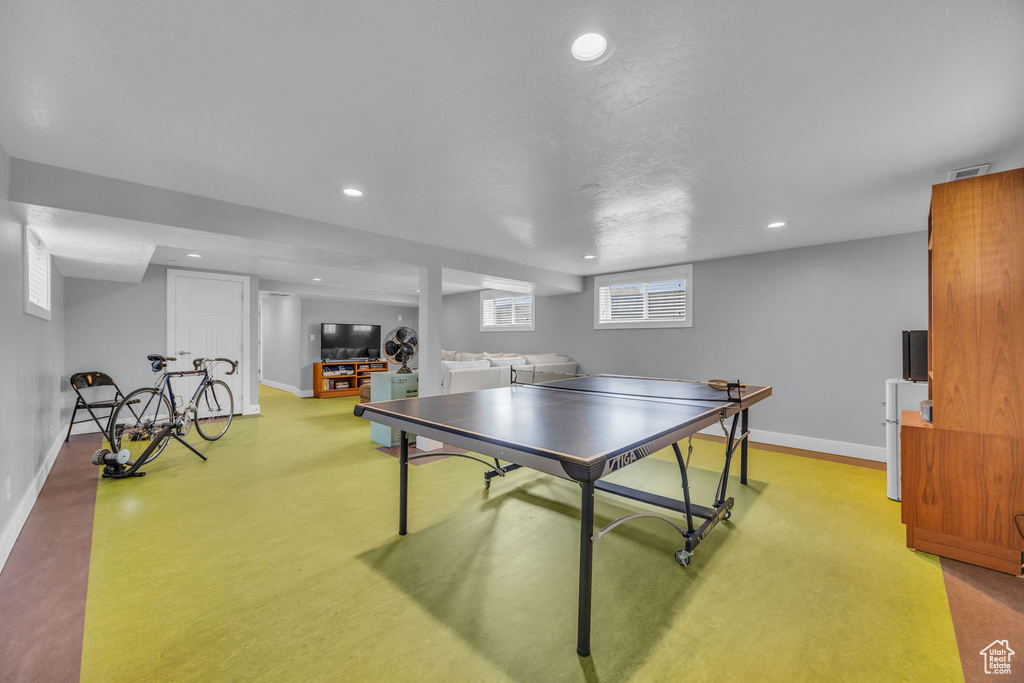 Playroom with recessed lighting and baseboards