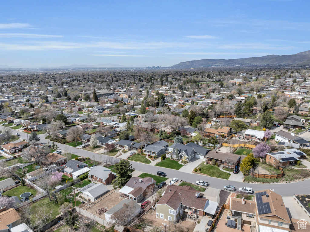 Drone / aerial view featuring a mountain view and a residential view