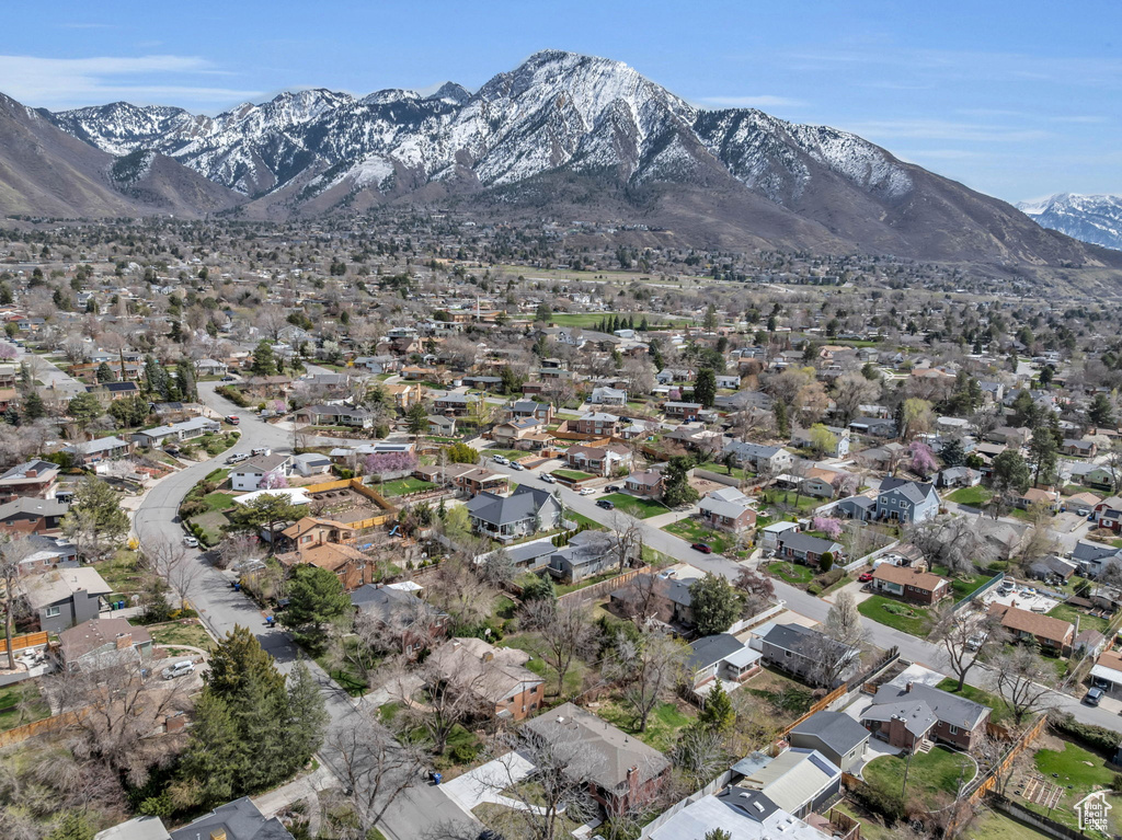 Drone / aerial view with a residential view and a mountain view