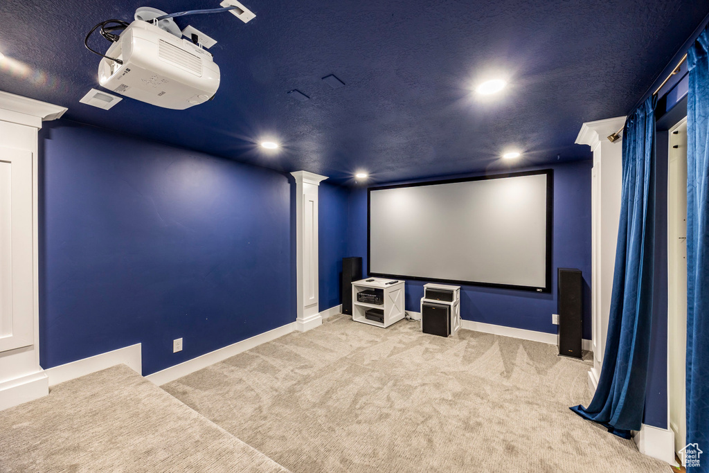 Home theater with carpet, recessed lighting, and decorative columns